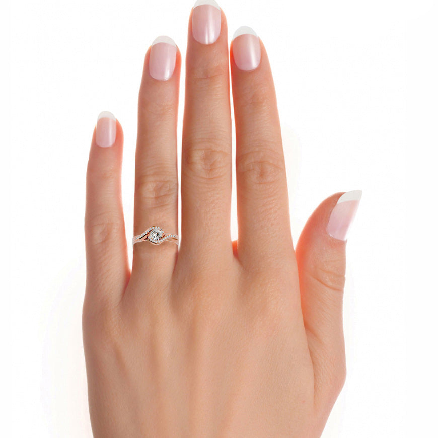 Infinity bypass diamond engagement ring