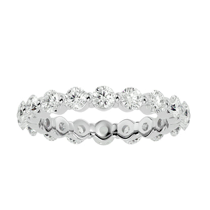 Floating prong diamond eternity ring