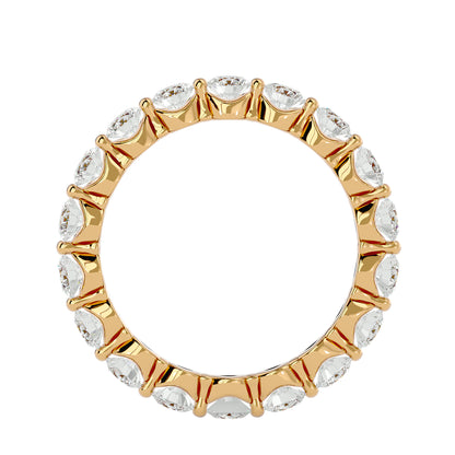 Floating prong diamond eternity ring