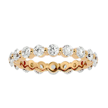 Floating prong diamond eternity ring