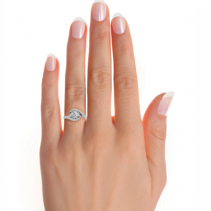 Twisted halo diamond engagement ring